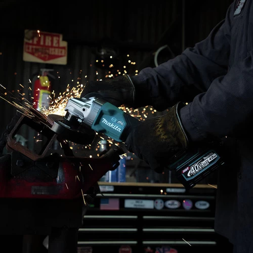 Makita GAG06M1 40V Max XGT Brushless Lithium-Ion 4-1/2 In./5 In. Cordless Paddle Switch Angle Grinder Kit With Electric Brake And AWS (4 Ah) 9 Makita GAG06M1 40V Max XGT Brushless Lithium-Ion 4-1/2 In./5 In. Cordless Paddle Switch Angle Grinder Kit With Electric Brake And AWS (4 Ah) - Image 9