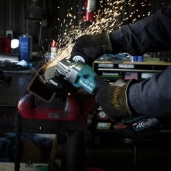 Makita GAG06M1 40V Max XGT Brushless Lithium-Ion 4-1/2 In./5 In. Cordless Paddle Switch Angle Grinder Kit With Electric Brake And AWS (4 Ah) 29 Makita GAG06M1 40V Max XGT Brushless Lithium-Ion 4-1/2 In./5 In. Cordless Paddle Switch Angle Grinder Kit With Electric Brake And AWS (4 Ah) -Tool Store mktngag06m1 i